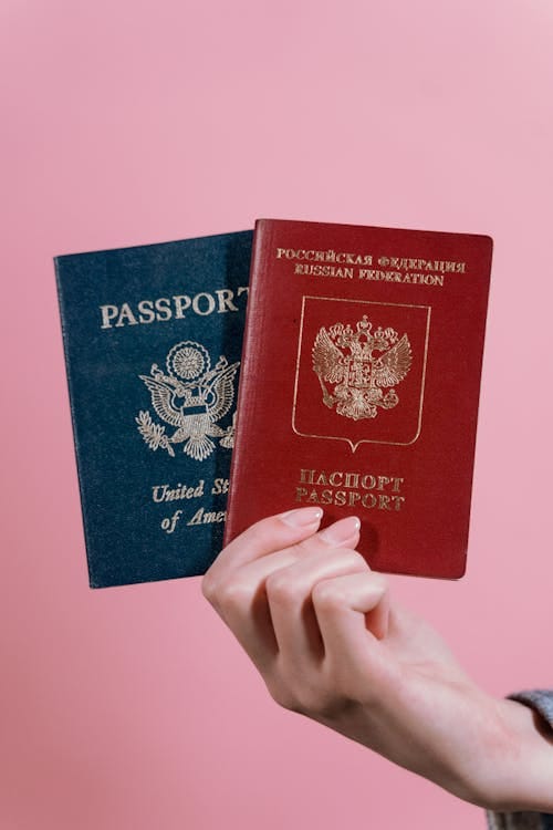 A Person Holding Passports