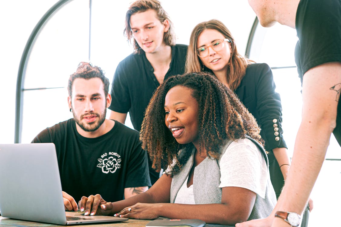 Woman presenting to colleagues